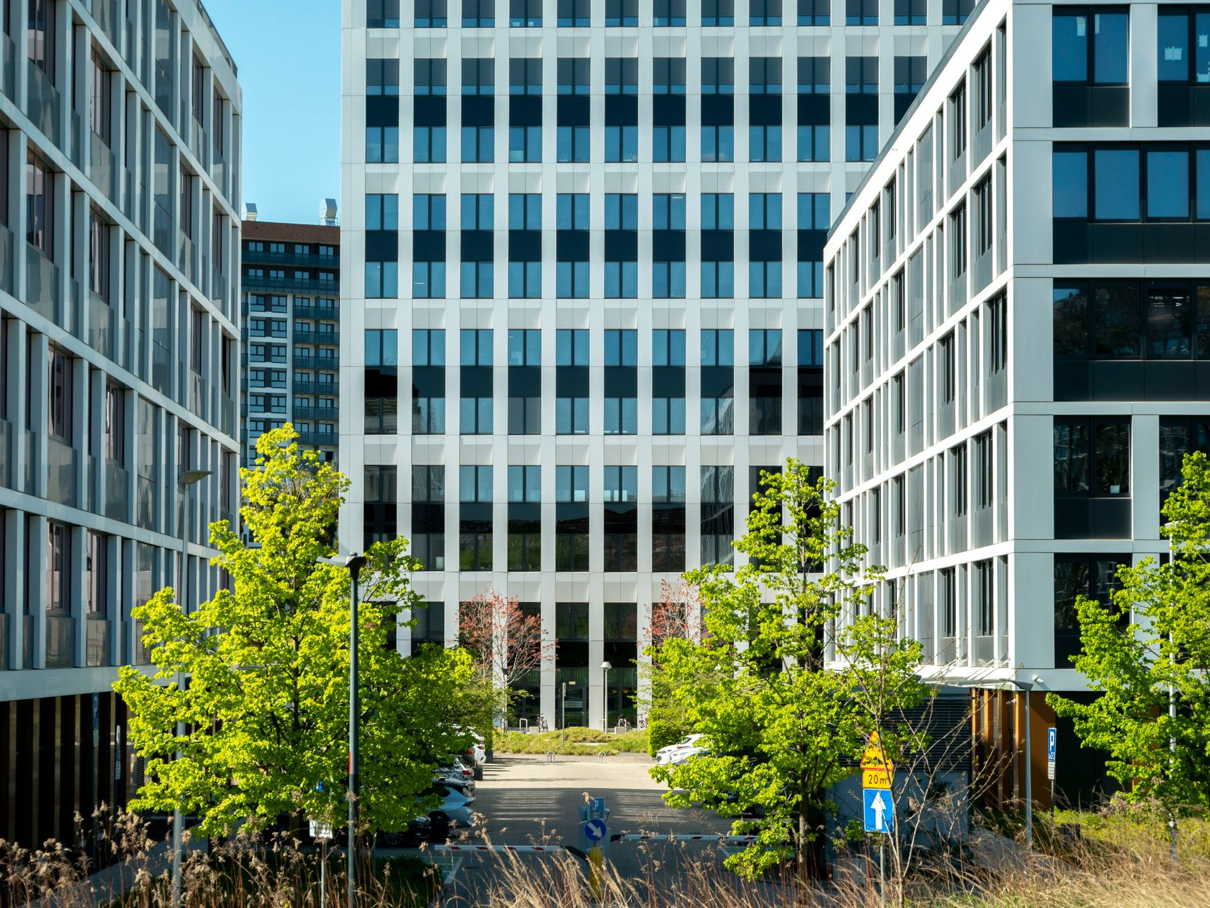 Contemporary office buildings in the business district of Wrocław, Poland, showcasing modern design and urban development.